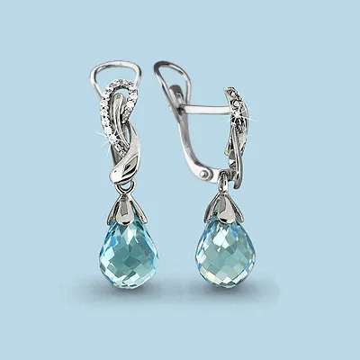 4425902А Серьги из Серебра с топазами скай блю, фианитами