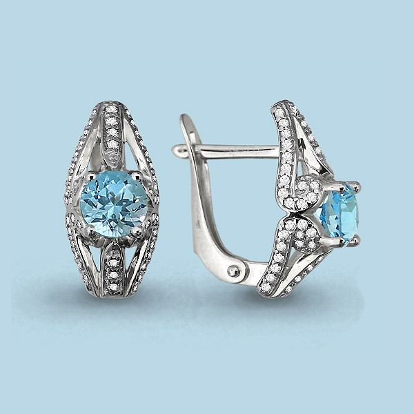 4297202А Серьги из Серебра с топазами скай блю, фианитами