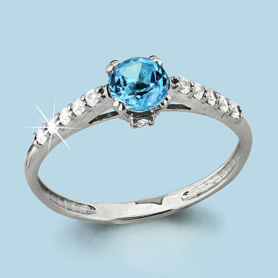 6516405А Кольцо из Серебра с топазом свисс блю, фианитами